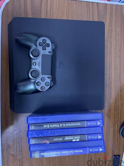 ps4 slim + 7 games with pack