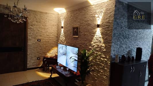 Apartment for sale in the second neighborhood of October 6, behind Al-Hosari, 120m + private garden 150m, elevated ground floor, two rooms, bathroom, super lux finishing, including air conditioning and kitchen, distinguished location