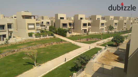 Resale townhouse for sale, ready for immediate delivery, in Woodville Compound, near New Giza, Sheikh Zayed