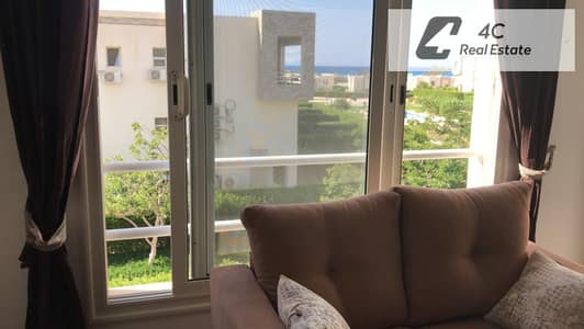 بسعر اقل من الماركت شاليه sea view تشطيب كامل بالفرش-امواج الساحل الشمالي بتقسيمه مميزه واقل سعر جاهز للمعاينه