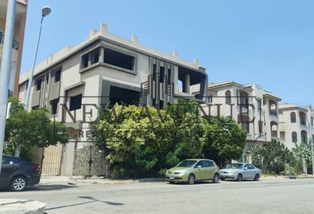 A multi-apartment villa with pool Ready to move and fully finished - new cairo