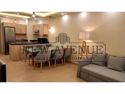 Ground chalet with garden and prime location direct on lagoon For sale  fully finished and furnished located in Azha Ain sokhna phase Pavo