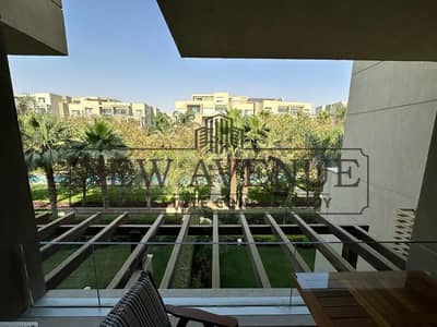 Furnished Apt overlooking greenery & water feature