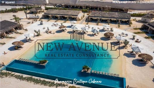 For sale, a chalet (resale), complete in installments from M Square - Al Masyaf, North Coast - directly on the lagoon