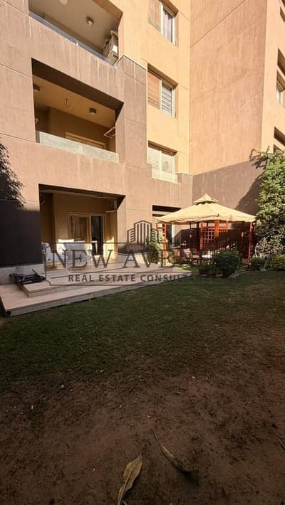 شقة أرضي غرفتين نوم بحديقة خاصة واسعة تشطيب كامل جاهزة للاستلام الفوري داخل كمبوند Palm Hills القاهرة الجديدة موقع مميز وخصوصية كاملة