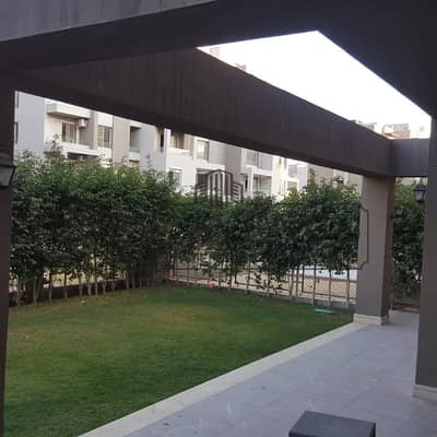 Best price for Fully finished 3 bedrooms Ground apartment with garden with dp and installments Ready to move for sale in Village Gardens Katameya