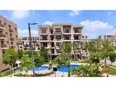 Apartment for sale in Taj city Zone T Overlooking greenery and water features fully finished Ready to move