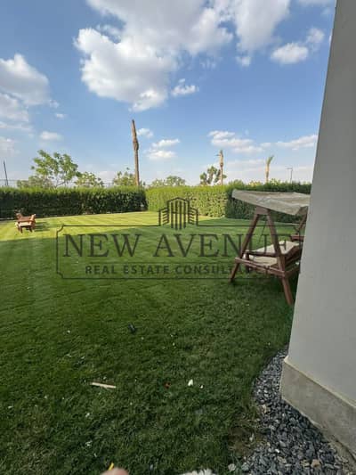 Apartment with Huge garden Finished with kitchen and ACs in Uptown Cairo Ready to move Facing North The fourteen Phase