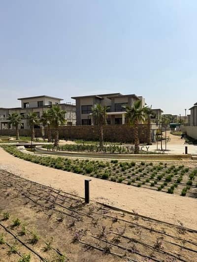 Standalone Villa Type A with very prime location on wide landscape and water features in Scarlet Swan Lake Residence New Cairo by Hassan Allam