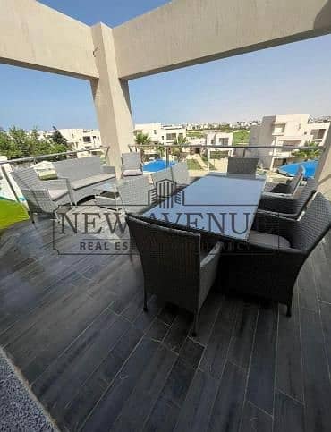 Ready to move high end finishing and furnishing Upper Senior Chalet second row golf  for sale in Hacienda bay North Coast developed by Palm Hills