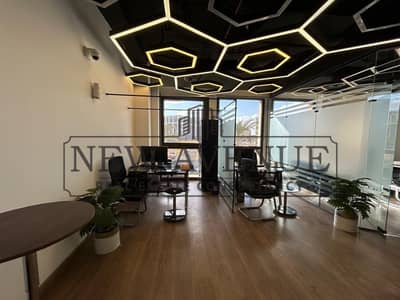 مكتب إداري 105 متر مربع مع موقف سيارات للإيجار في Mivida business Park  القاهرة الجديدة  مزود بمصاعد عالية السعة