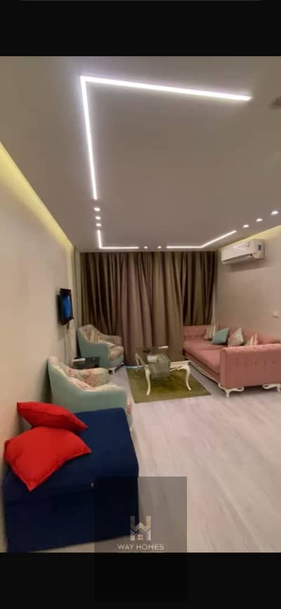 Furnished apartment for rent in Madinaty B10, ground floor with a private garden, area 70 meters, super lux finishing, and a 40-meter garden with a garden view, modern furniture.
