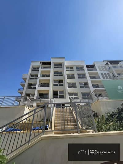 For rent: Fully finished apartment with air conditioning and kitchen in a prime location in Blue Views Mivida - ready for immediate occupancy at the l