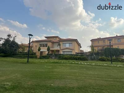 Detached villa in Madinaty, model C, with luxurious finishing and a stunning view.