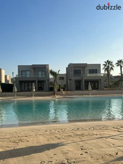 شالية  للبيع متشطب بالكامل بالتكييفات ,والمطبخ في أزهى الساحل الشمالي، بإطلالة على الكريستال لاجون.