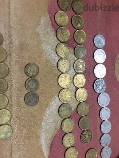 عملات معدنيه ابيض واصفر سنه 67 و 73