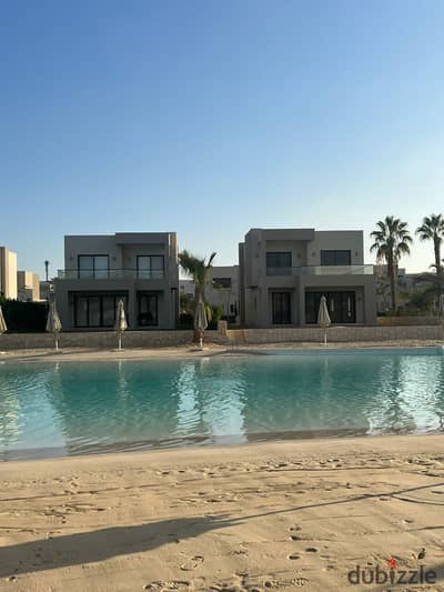 توين هاوس مع جاردن للبيع متشطب بالكامل بالتكييفات  ,والمطبخ في أزهى الساحل الشمالي، بإطلالة على الكريستال لاجون.