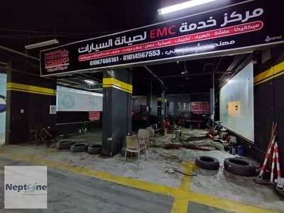 مركز صيانه 75م للايجار منطقة الحصرى موقع متميز