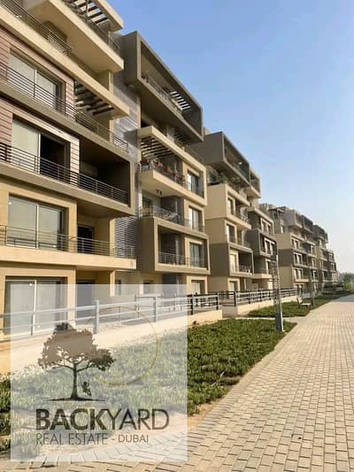 At the old price, an apartment with a private garden fully finished in Palm Hills Compound, New Cairo