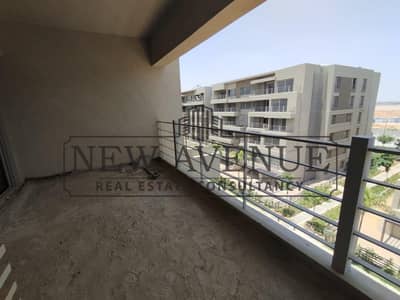 شقة للبيع في كابيتال جاردنز  Capital   gardens   مستقبل سيتي من بالم هيلز  جاهزة للاستلام موقع مميز تطل علي  مساحات خضراء