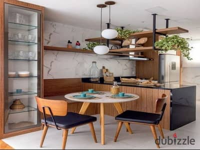 A fully finished studio apartment with air conditioning, plus free garage and club access, is for sale near the Diplomatic Quarter with a down payment