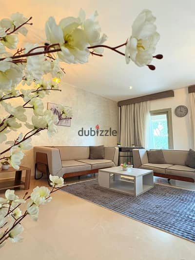 Ground floor apartment with garden in Uptown Cairo, furnished and equipped, prime location
