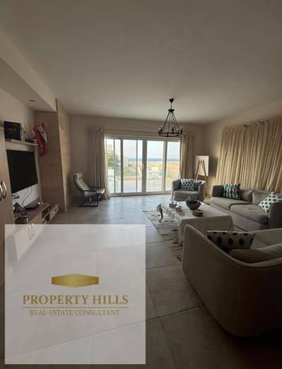 For sale in Ras Al-Hikma, a chalet with a private garden, hotel finishing, including air conditioning and kitchen