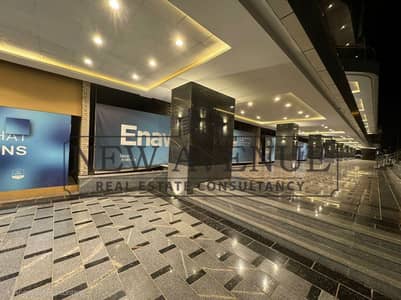 Retail For Rent in Enawalks plaza view With Outdoor Area 6 Sqm