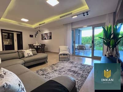 Apartment for sale in Fustat, ready for viewing, two rooms in Arabesque Compound, at a special price with installments, overlooking a landscape view.