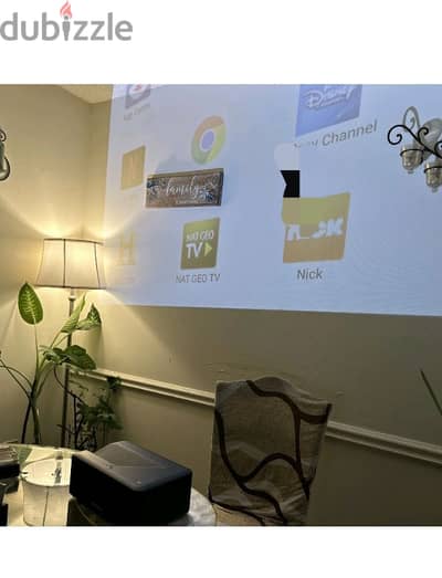 Brookstone UST Smart Projector w JBL Subwoofer Builtin