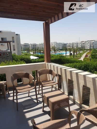 Chalet with roof 85 m , for sale at the lowest price, fully finished and furnished , prime location with an open pool view in Amwaj North Coast