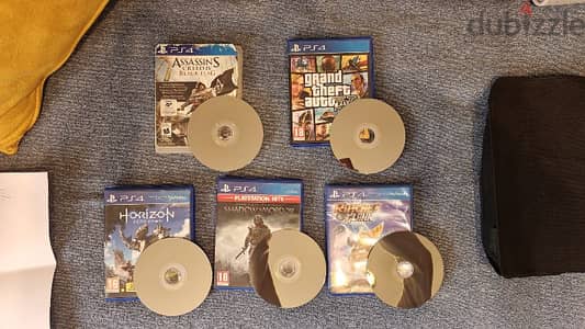 Playstation 4: x5 games bundle + dual charger