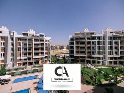 apartment for sale with a garden, 5% down payment, in the heart of New Cairo's Fifth Settlement, in the Golden Square, Icon Compound, wit