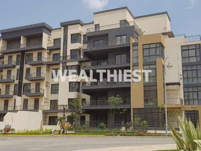 Apartment for sale with down payment and installments in Madinaty B8 premium phase with garden view prime location near Madinaty Club services banking
