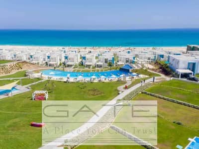 Ground floor chalet with garden for sale in Fouka Bay – North Coast Phase 3 – Resale, in a prime location directly on the lagoon