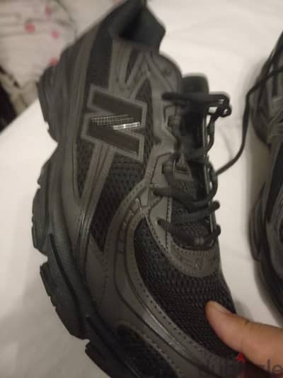 new balance 720 triple black
