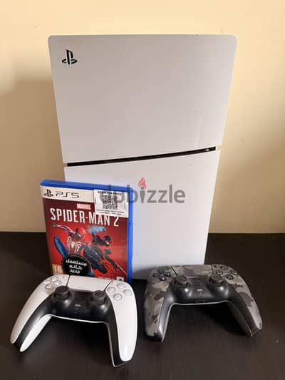 Slim PlayStation 5 1TB with 2 controllers and 19 installed games