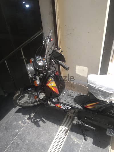 tvs xl 100