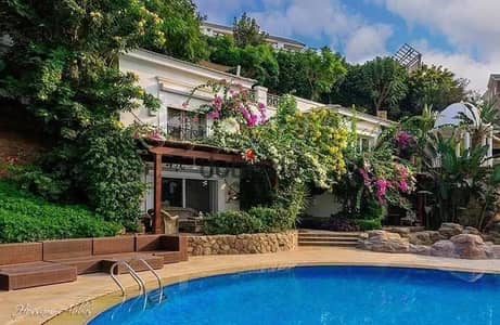 fully finished villa with garden ready to move corner open view landscape opposite the Public Prosecutor's Office Mountain View 1.1 Compound