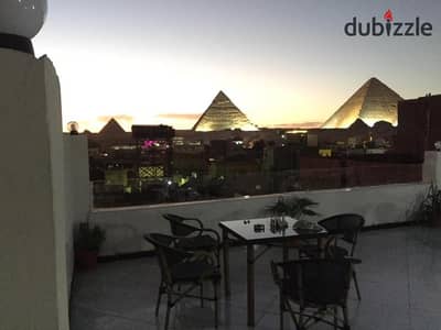 Opportunity: Roof + Outdoor Area with Pyramids View  For sale at a very special price Located in a premium compound next to the Grand Egyptian Museum