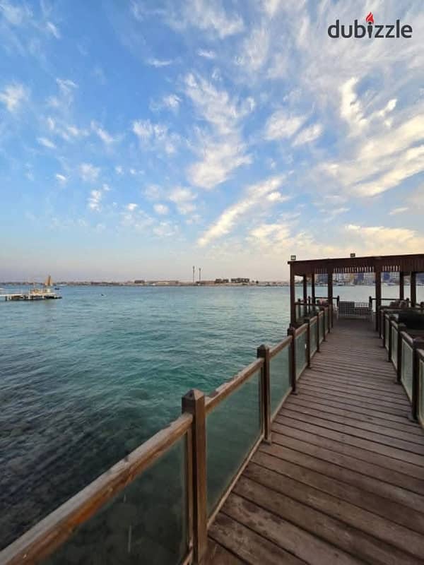 شالية للبيع متشطب بالكامل بفيو مميزعلي المارينا في مارينا 5  بالساحل الشمالي