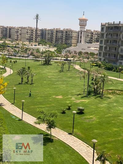 Apartment for sale in Madinaty, 143 square meters, special finishes, wide garden view, next to services