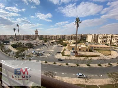 شقة للبيع في مدينتي 143 متر تشطيبات خاصة وايد جاردن فيو the spine بجوار الخدمات