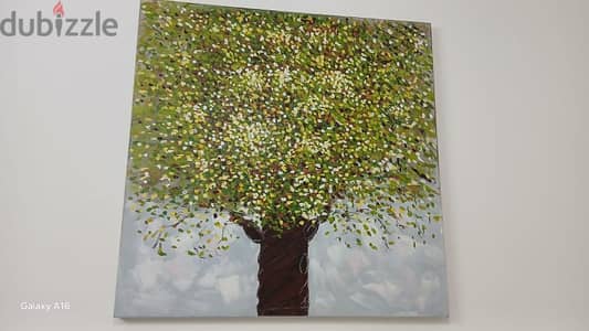 لوحه كبيره ب رسمه طبيعيه يضيف لمسه للمكان