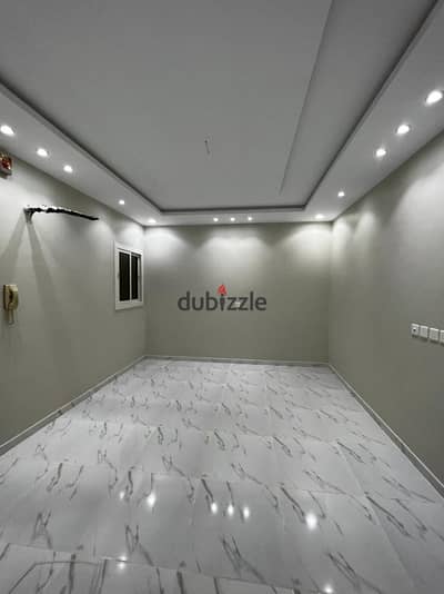 fully finished  garden apartment with a panoramic view in  Sheikh Zayed, in front of Zed Towers