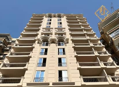 Apartment for sale in Mohandessin, 130 square meters, in a square branching off from Arab League Street.