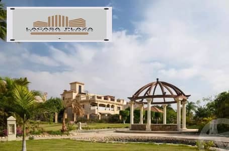 For rent: Twin House with kitchen and air conditioning in Compound Daria Gardens, in front of Mall of Arabia, prime location.