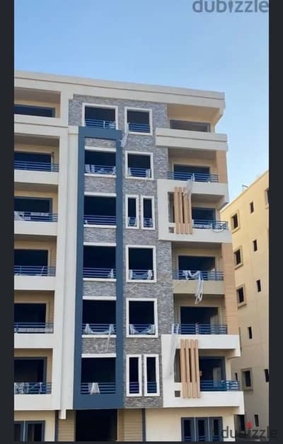 Apartment for sale in the 9th District, 6th of October City, with payment facilities, minutes from Mall of Arabia, Al Hosary Mall, and Shooting Club.