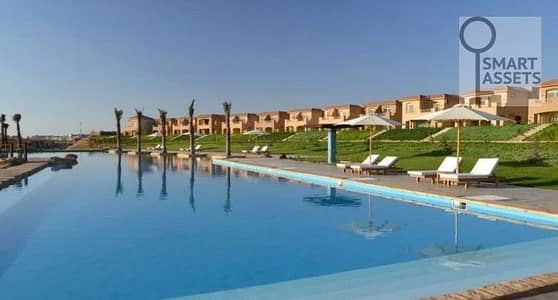 شاليه بإطلالة لاجون وبحر في تلال شورز ( Telal shores )