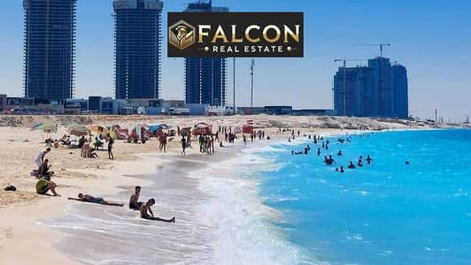 شاليه مميز فيو عاللاجون بمقدم 330 الف فى العلمين الجديده الساحل الشمالى بسعر اللونش بجوار قريه مارينا وبفيو مميز على ابراج العلمين
